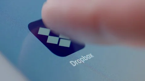 Man Clicks On Dropbox Icon App On Tablet PC Stock Footage 123046347