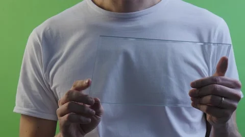 Man Clicks a Tablet Taps a Finger Golden Ring Virtual Tablet Buys Through Stock Footage 61013496