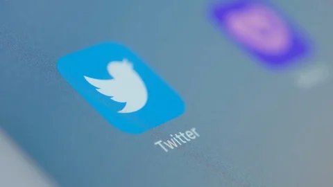 Man Clicks On Twitter Icon App On Tablet PC Stock Footage 123046333