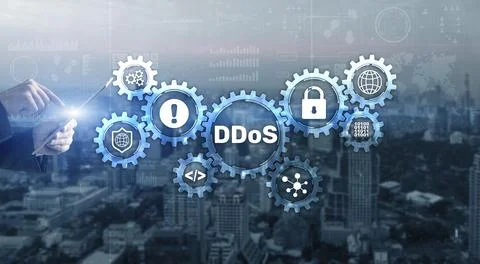 Man clicks on virtual screen with text DDoS Cyber Attack Stock Photos