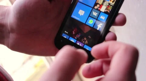 Man clicks on your phone Stock Footage 60122030