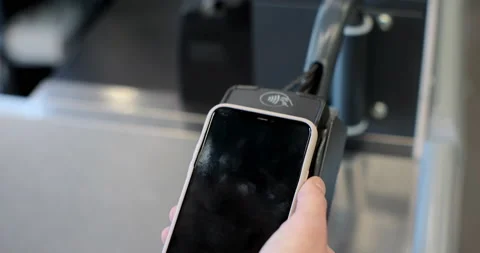 Man client hand on pos-terminal seller or store employee in food supermarket Stock Footage 189836124
