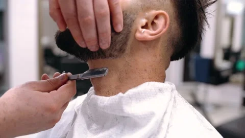 A Man Client Visiting Haidresser In Barber Shop, Beard Trimming Stock-Footage 143133335