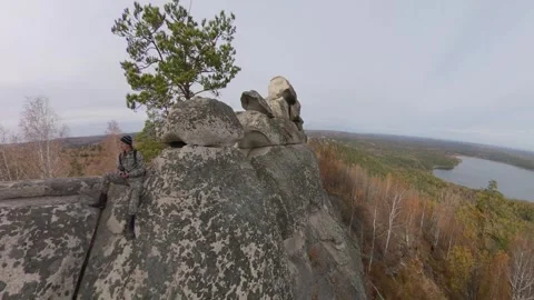 A man on a cliff. 스톡 동영상 332351399