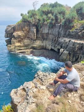 A man on the cliff Stock Photos