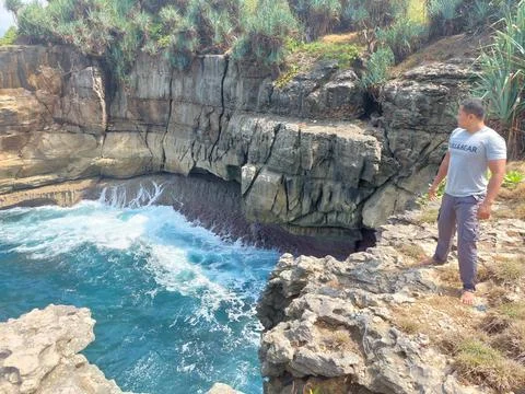 A man on the cliff Stock Photos