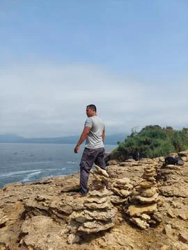 A man on the cliff Stock Photos