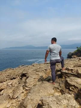 A man on the cliff Stock Photos