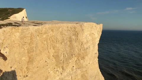Man on a cliff at the seaside Stock Footage 130903168