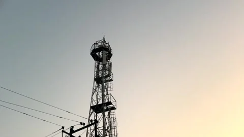 Man climb on mobile tower Stock Footage 323103669