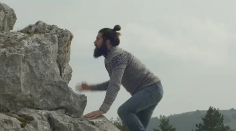 Man climb on mountain Vídeo Stock 64577321