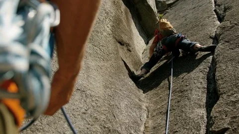 Man climber on rock wall Mount Habrich Canada Stock Footage 80044164