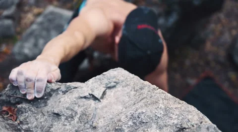Man climbing on cliffed rock belay Stock Footage