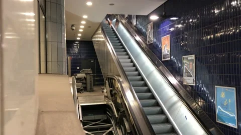 Man climbing elevator next to an dismantled elevator Stock Footage 133656768