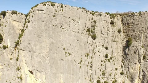 Man climbing a high cliff in free solo, Verdon, France Video stock 101597457