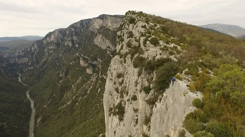 Man climbing a high cliff in free solo, Verdon, France Stock Footage 101598843