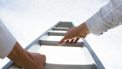 A man climbing a ladder Stock Footage