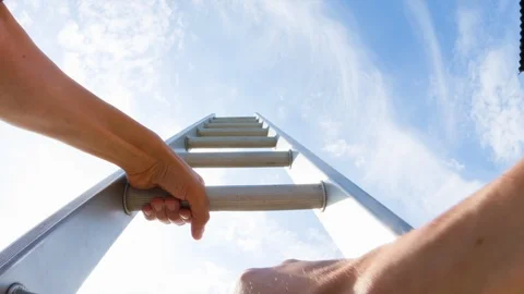 A man climbing a ladder Video stock 104218501