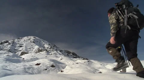 Man climbing mountain. Stock Footage 49793206