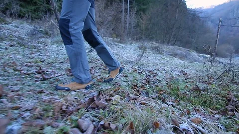 Man climbing a mountain Stock Footage 87084692
