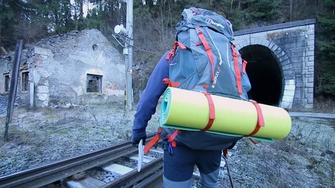 Man climbing a mountain Stock Footage 87084705