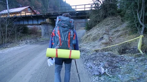 Man climbing a mountain Stock Footage 87084715