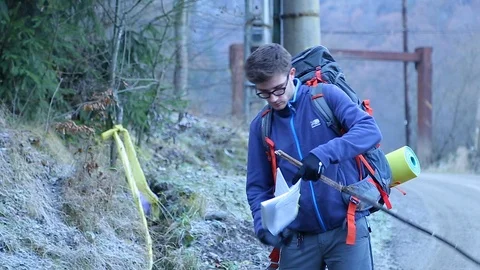 Man climbing a mountain Stock Footage 87084803