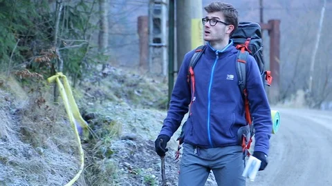 Man climbing a mountain Stock Footage 87084809