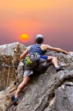 Man climbing mountain Foto stock