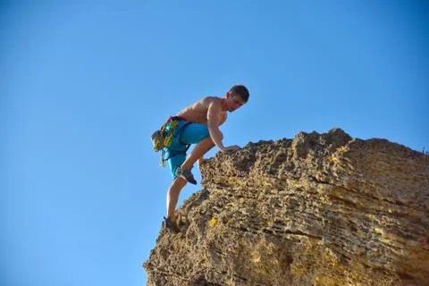 Man climbing on Mountain Stock Photos