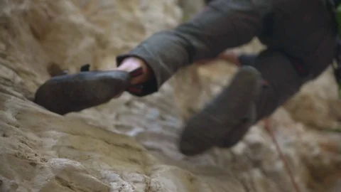 Man Climbing The Rocks, Reaching The Top Of Alps Stock Footage 114764880