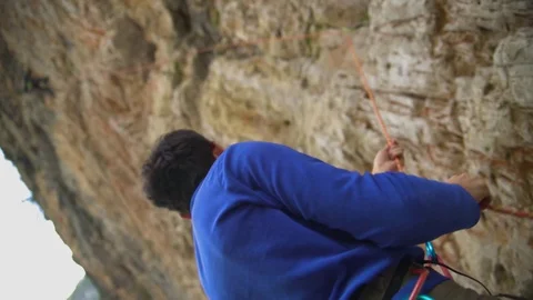 Man Climbing The Rocks, Reaching The Top Of Alps Stock Footage 114764952