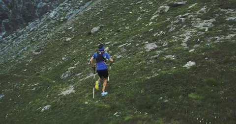 Man climbing run on mountain rise.Trail runner running to top peak training on Stock-Footage 108757330