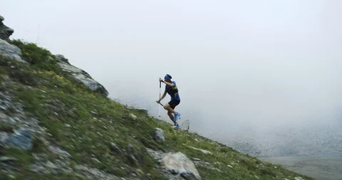 Man climbing run on mountain rise.Trail runner running to top peak training on Stock Footage 109363755