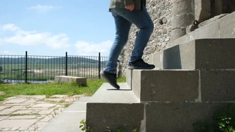 Man climbing stairs Stock Footage 196739869