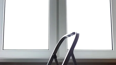 Man climbing by a step-ladder 스톡 동영상 70751466