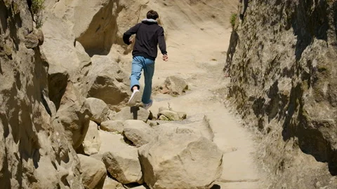 A man climbs in the mountains. Selective focus. Stock Footage 196950026