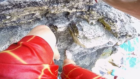 Man climbs up the stones Stock Footage 102031429