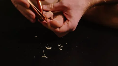 Man Clips Toenails on Dark Floor During Winter Night – Self Care Close Up Stock Footage 321341730