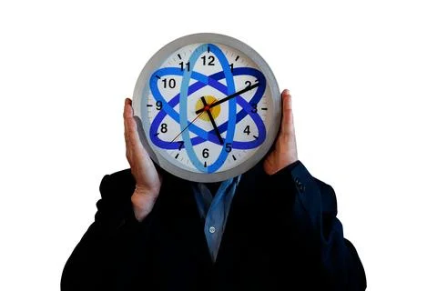 Man with clock face and atomic symbol concept Foto stock