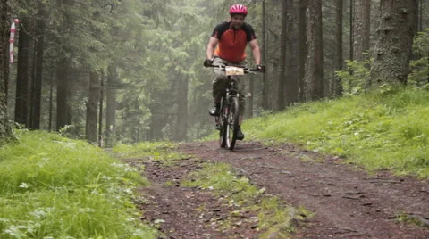 Man close on mountain bike Stock Footage 53000516