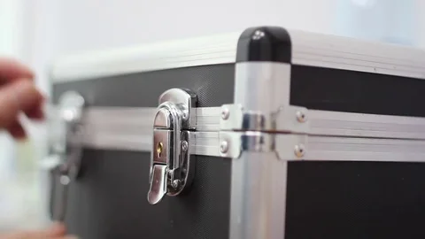 The Man Closed The Locks on the Case Stock Footage 83488407