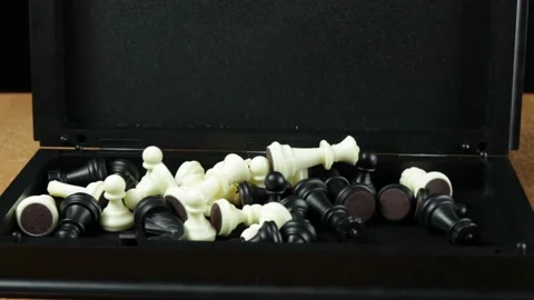The man closes the chess box. Stock Footage 145385607