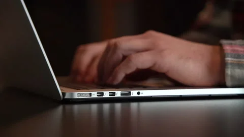 Man closes laptop in the office Stock Footage 158983328