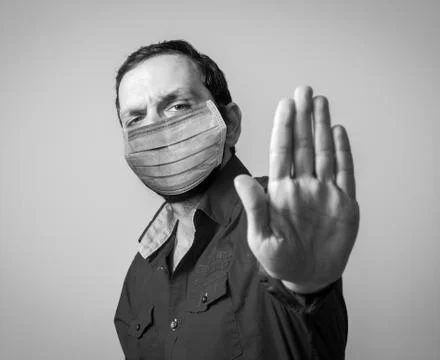 Man closeup with the protective mask Stock Photos