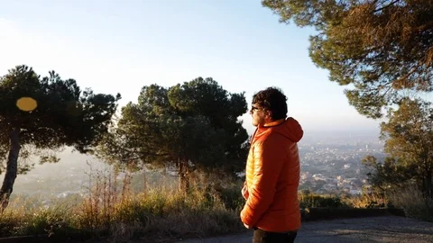 Man closing his zipper jacket Stock Footage 104123585