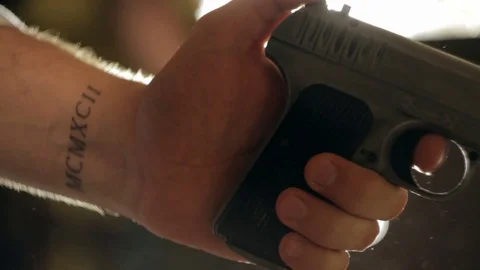 Man cocks the gun close-up Stock Footage 71544081