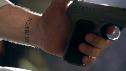 Man cocks the gun close-up Stock Footage 71544215