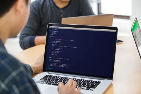 Man coding and programming for web development and web design concept using lapt Foto stock