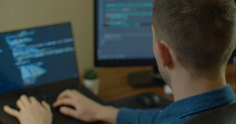 Man coding html and programming on screen Monitors, development web, developer. Stock Footage 129447730